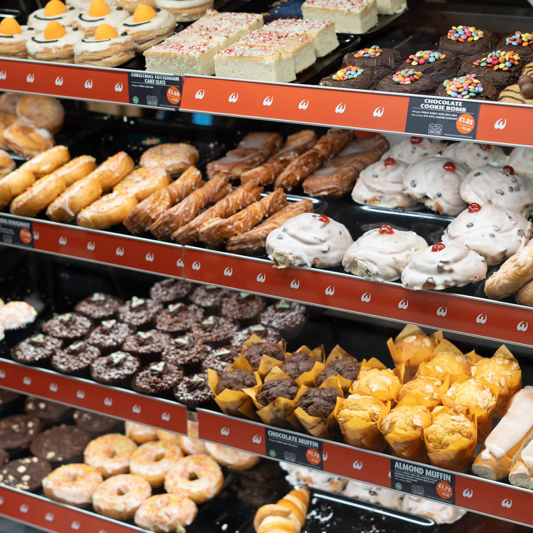 A selection of baked goods on retail shelving